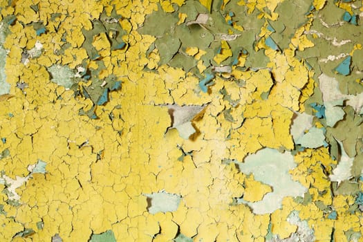 Old damaged paint on a concrete wall background