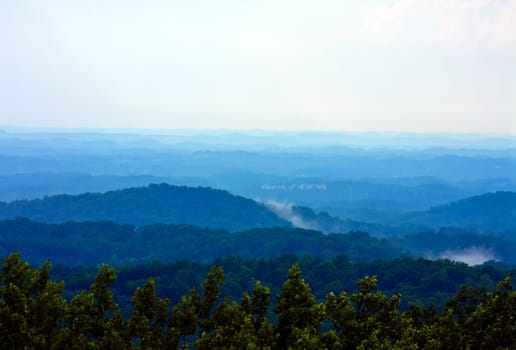 smoky mountains hazy blue skies and the smoke or fog line
