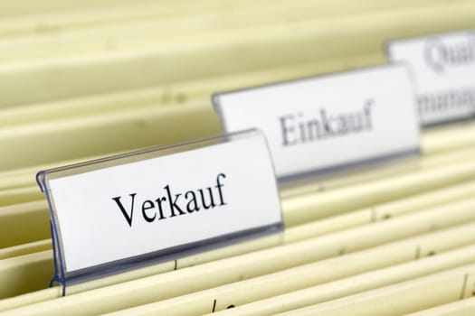 Close-up hanging folder "Verkauf"" what means ""Sale"" in German"