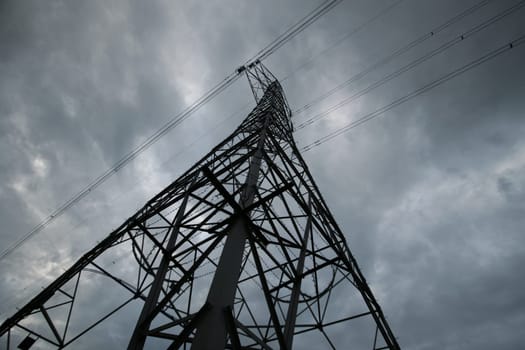 An electricity pylon against a moody evening sky. There's a storm brewing!