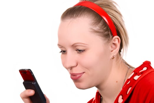 Girl in red with mobile phone on white