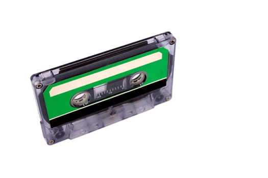 Compact Cassette isolated on white. Vertical right perspective view