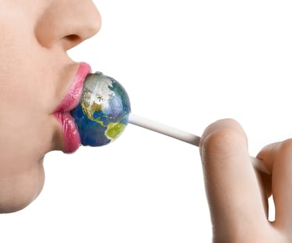 Woman kissing lollipop as earth isolated on white