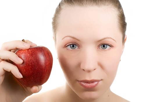 Portrait of young woman with apple, isolated on white