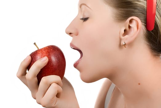 woman eating apple isolated on white