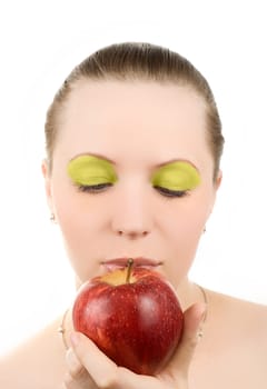 Portrait of young woman with apple, isolated on white