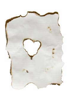 An isolation of a burned piece of paper with a heart at the center