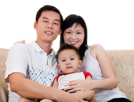 Happy Asian young father, mother and son.