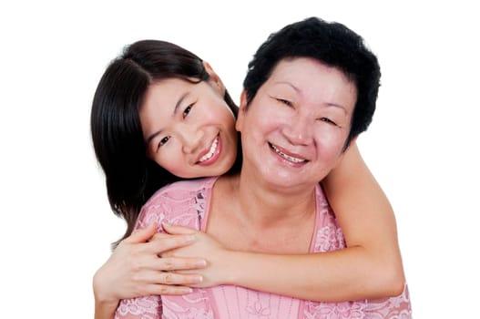 Happy Asian Family. Daughter hugging her mother.