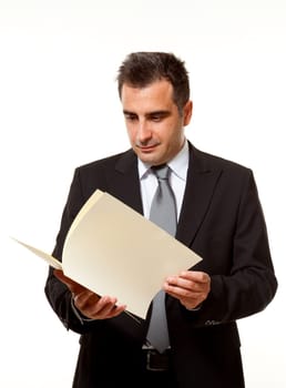 Businessman reads a document with query