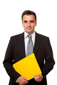 Businessman holds a yellow file from his office