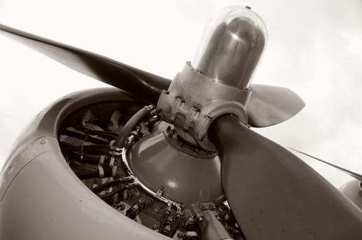 Giant engine and propeller on old bomber airplane