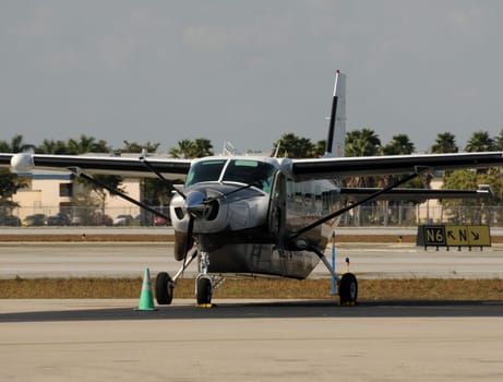 Propeller airplane parked on the ground