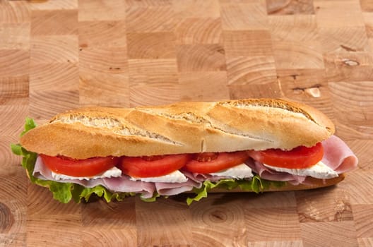 rustic french baguete with ham and cheese