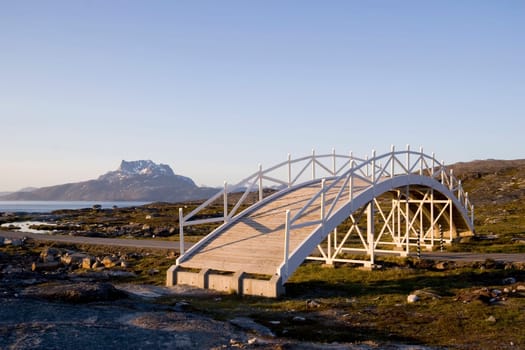 A bridge art piece in Nuuk, Greenland. Sermitsiaq, the mountain, is seen in the background.