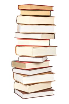 Pile of books isolated on white background. Path included