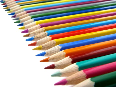 Color pencils set diagonal fragment on white