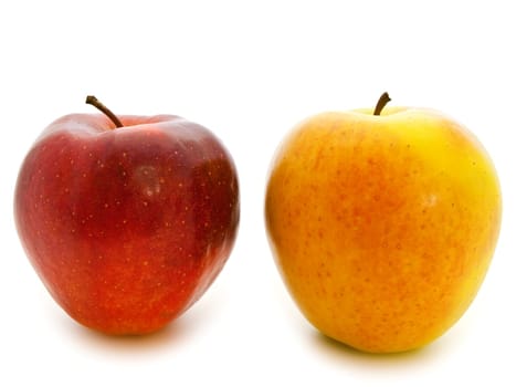 red and yellow apples over white background