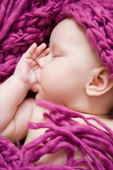 Portrait of  a 2 months sleeping baby girl.