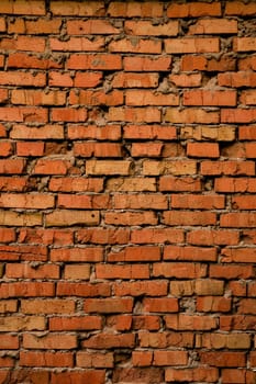 Grungy cracked old brick texture, natural light