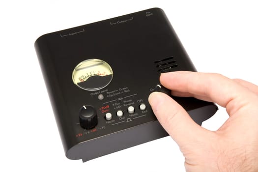 A professional microphone / guitar audio preamplifier with hand adjustment of controls