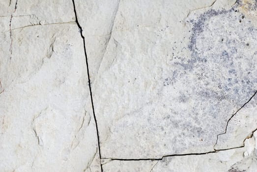 Grungy cracked stone background