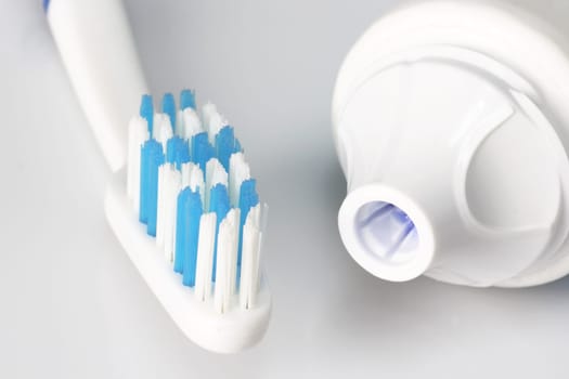 Dental care products on bright background