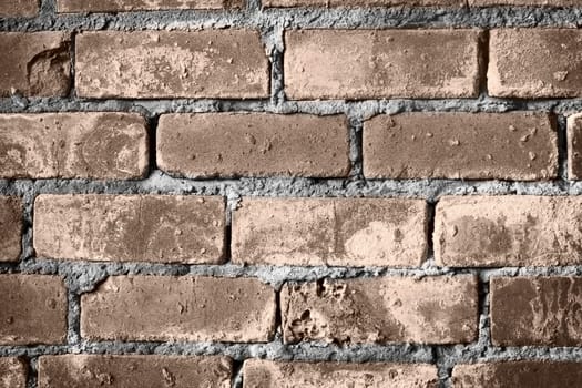 Brick wall of a building destroyed by time