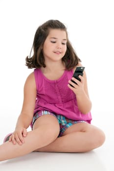 Cute Caucasian girls texting on a cell phone