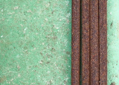 Old decayed wall with rusty pipes background