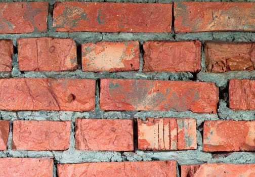 Brick wall of a building destroyed by time