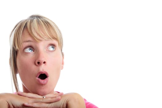 Surprised woman looking up with white background
