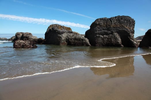Rocks in the sand on the beautiful Oregon coast