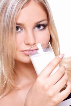 beautiful woman drinking milk on a white background