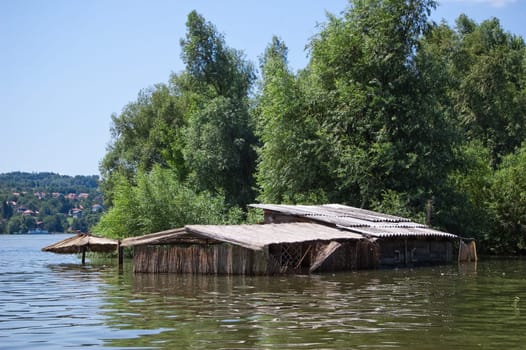 Old cane cottage flooded to the roof