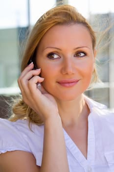 Beautiful businesswoman on the phone