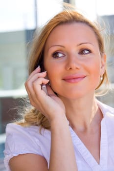 Beautiful businesswoman on the phone