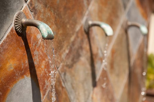 Beautiful Stone Wall Water Fountain Row Abstract.