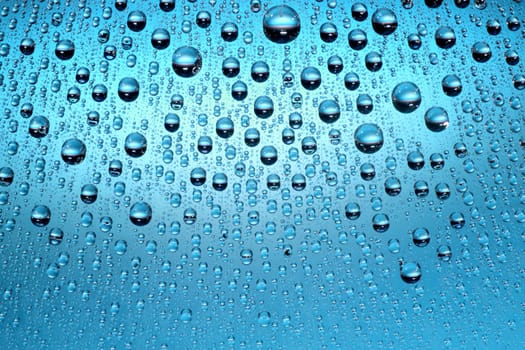 macro of blue water drops and bubbles