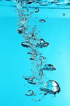 macro of blue water drops and bubbles