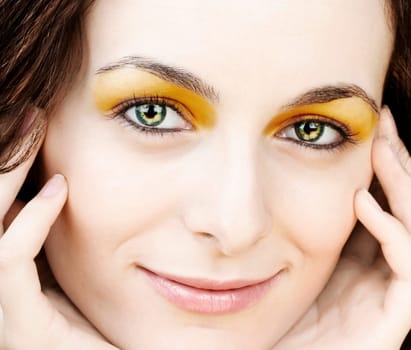 Beautiful happy woman with green eyes.