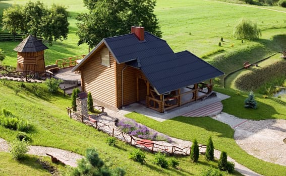 There is nice nature background with house and park