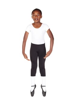 Young African ballet boy on white background and floor showing various ballet steps and positions. Not Isolated