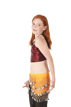 Young Caucasian belly dancing girl in beautiful decorated clothes on white background and reflective floor. Not isolated