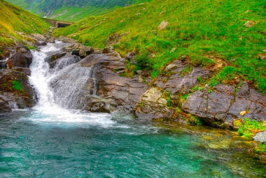 beautiful cascade and small lake, after the rain. HDR