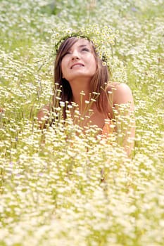 Smiling young woman on the meadow