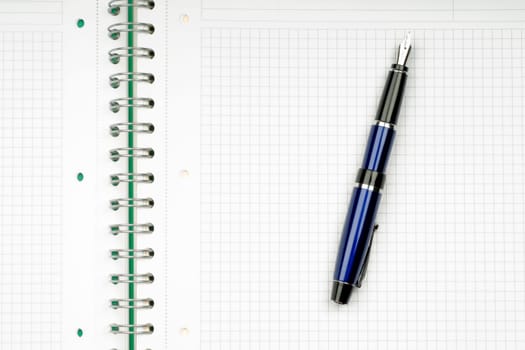 close up of notebook and pencil on white background with clipping path