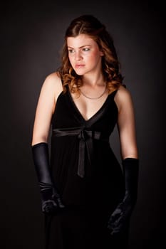 Serious young woman looking away