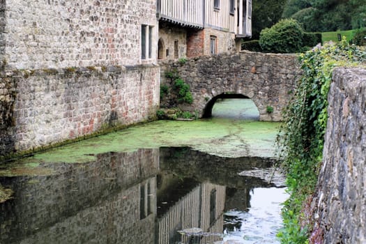Moat around medieval manor house
