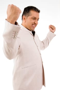 Successful businessman with his hands up